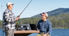 two men fishing with Growatt VITA 550 portable power station